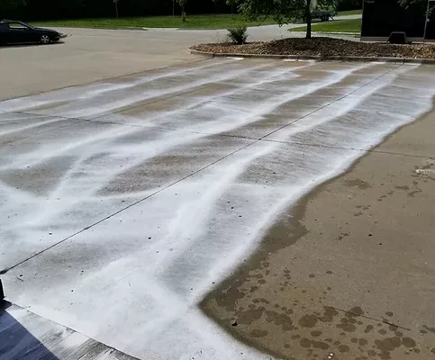 Cleaning concrete surface